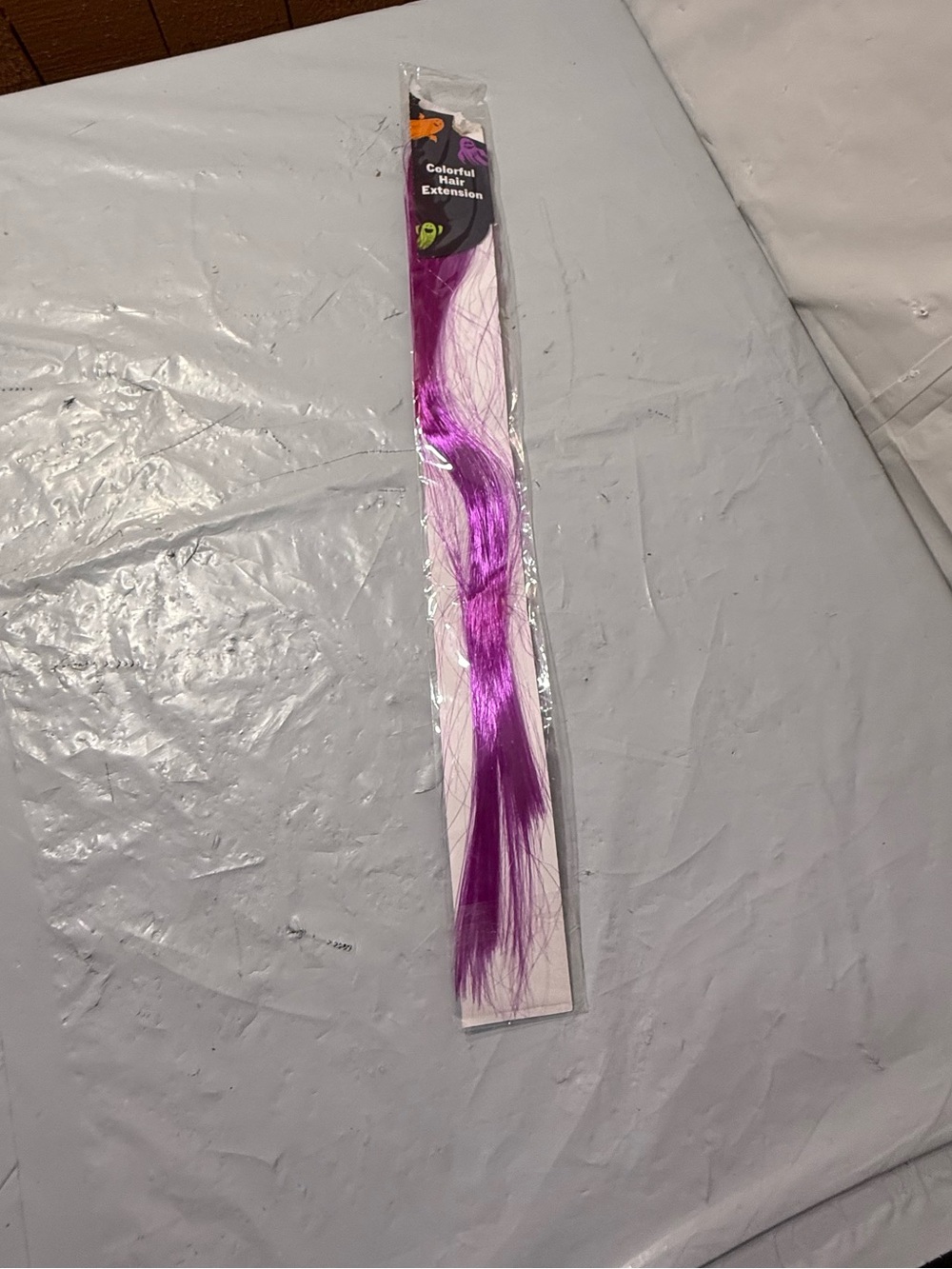 vibrant purple clip-on hair extension